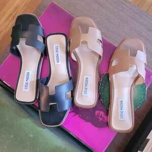 Steve Madden Black and Tan Slide Sandals.   $30 p/pair Or $50 for both